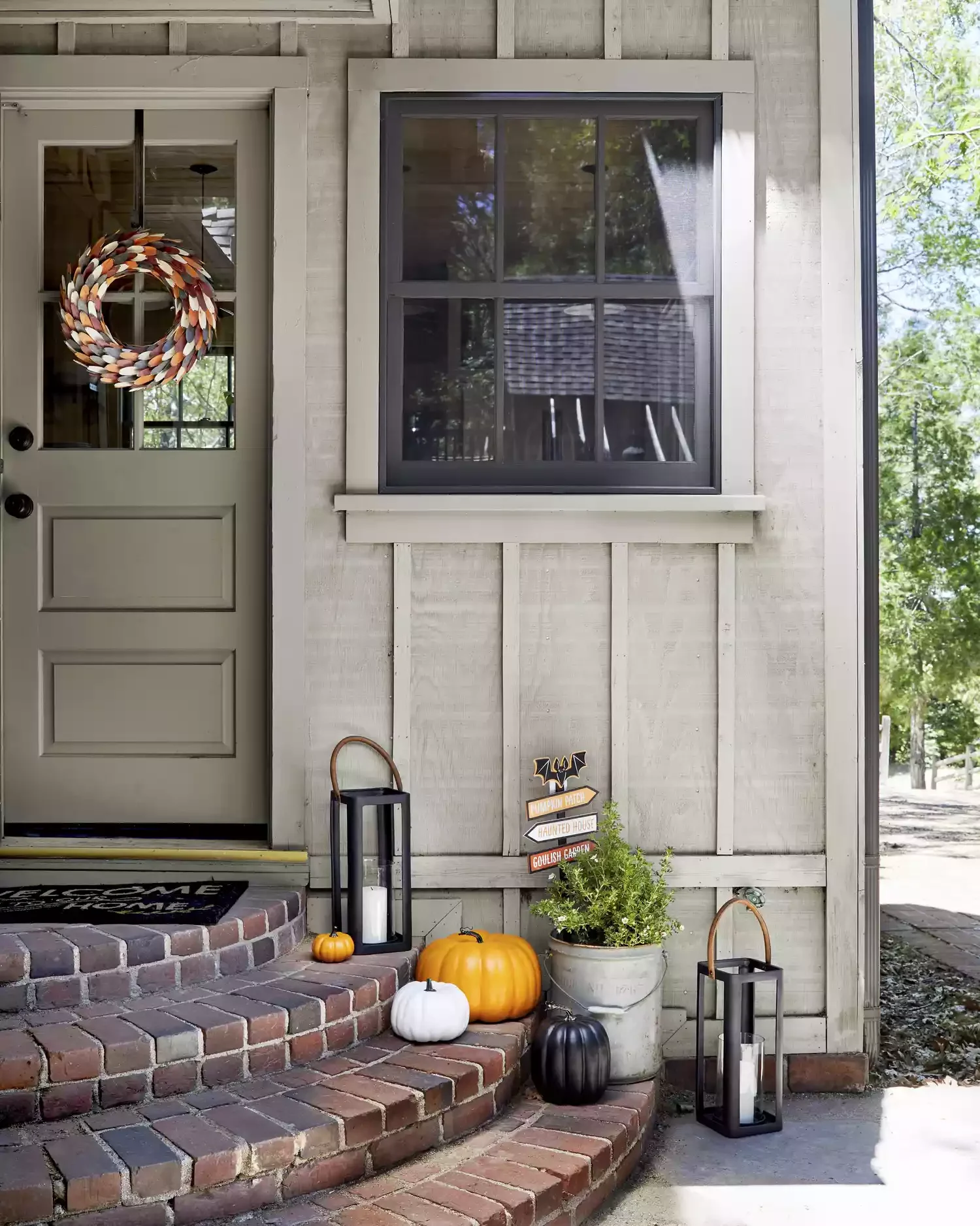 41 Beautiful Fall Outdoor Decorating Ideas to Transform Your Space This Season 12 Opt for Faux Pumpkins on Your Steps
