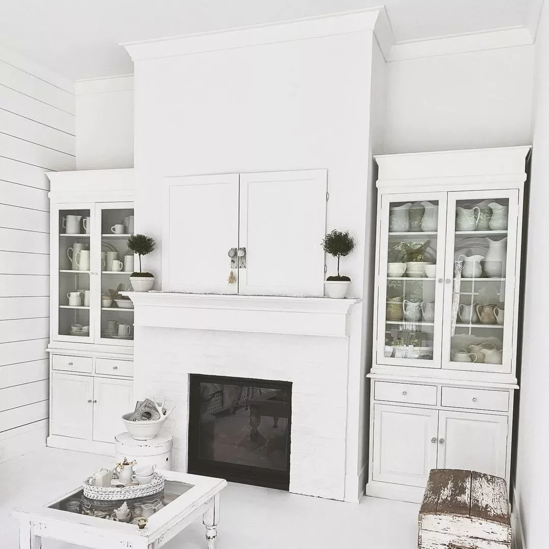 33 Smart Ways to Style Your TV Above the Fireplace Like a Pro 10 Opt for Folding Doors