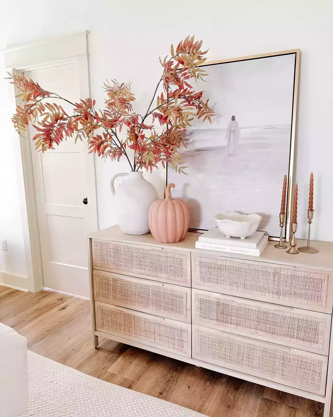22 Cozy Fall Decorating Ideas That'll Transform Your Apartment This Season 15 Opt for Orange Taper Candles