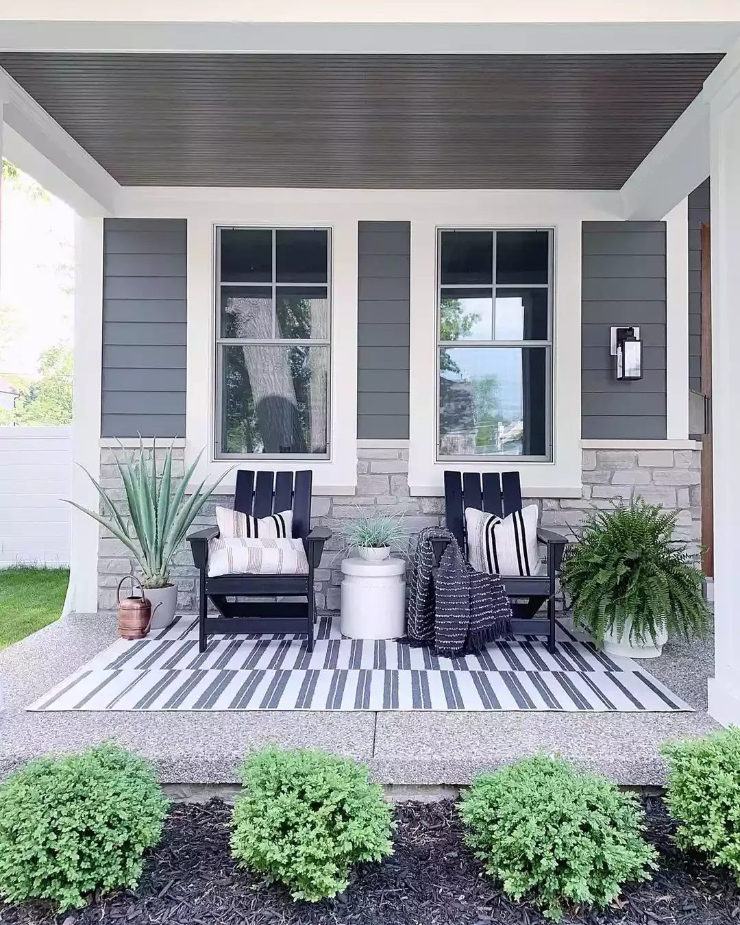 38 Charming Farmhouse Porch Ideas That Create the Perfect Welcome 31 Opt for Timeless Classics