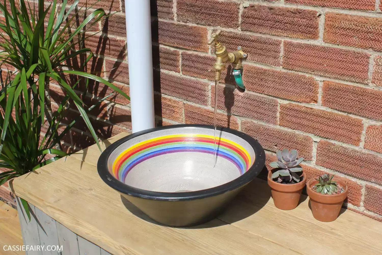 12 Brilliant Outdoor Sink Ideas That Will Transform Your Backyard 11 Opt for a Decorative Basin