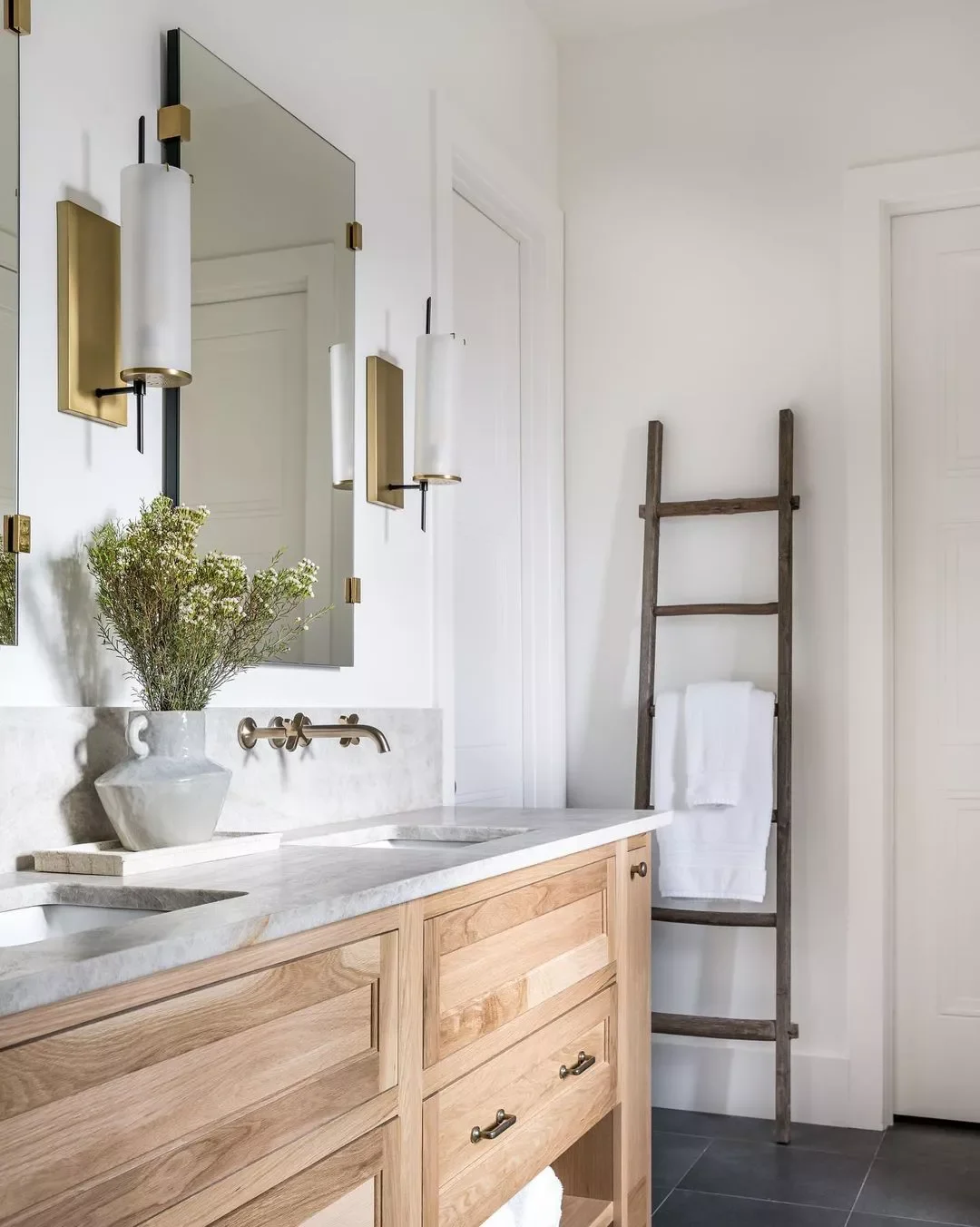 30 Bathroom Wall Decor Ideas That Refresh Your Space This Year Opt for a Leaning Ladder