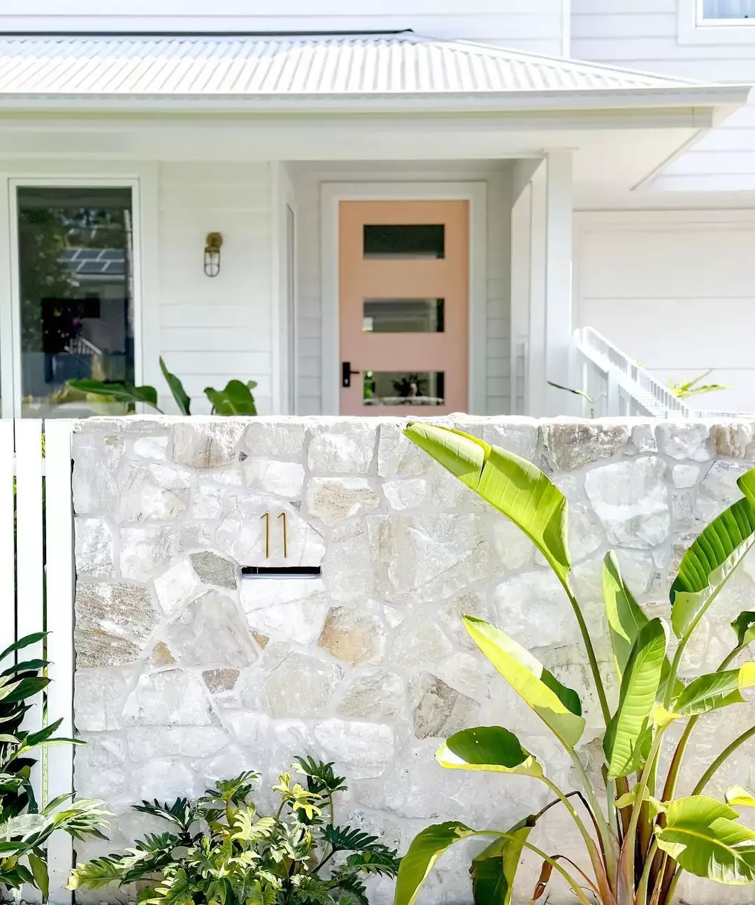 31 Stunning Front Yard Fence Ideas That Will Transform Your Home's Curb Appeal Opt for a Stone Fence or Wall