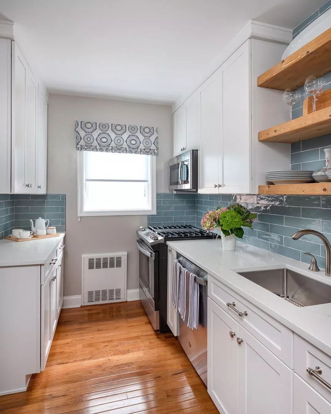 22 Budget-Friendly Small Kitchen Transformations That Create Maximum Impact 6 Optimize the Space Above the Sink