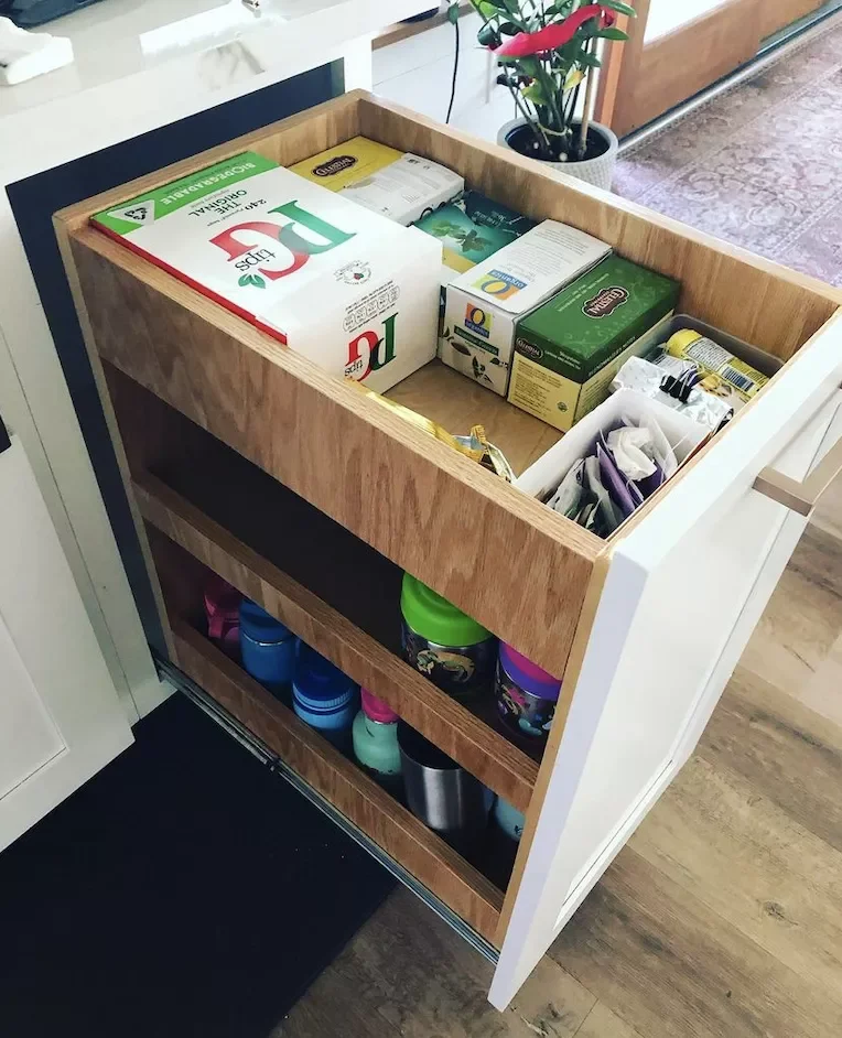 12 Clever Ways to Organize Your Water Bottle Collection Organize Bottles in a Narrow Drawer