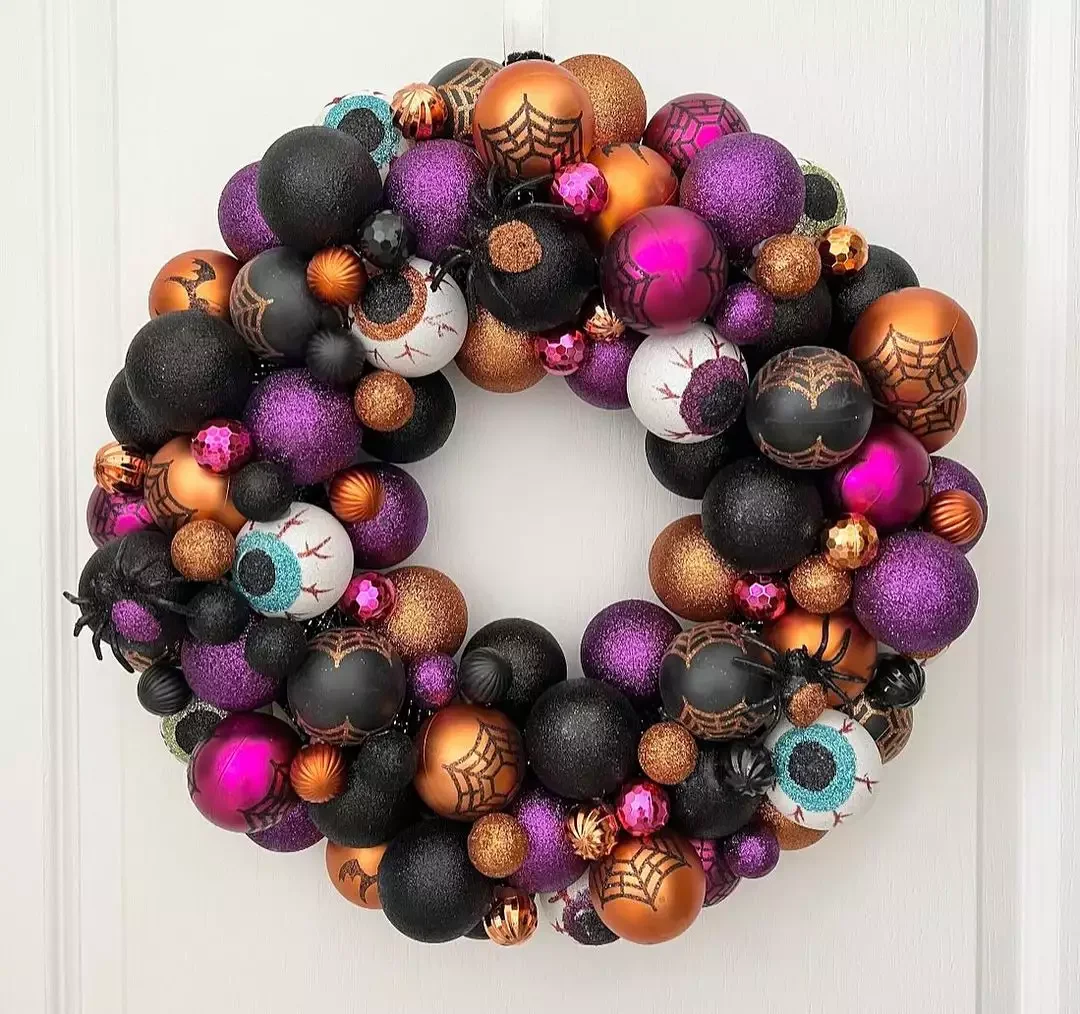 45 Spooktacular Halloween Wreath Ideas That Will Make Your Front Door the Neighborhood's Favorite Stop 37 Ornament Halloween Wreath