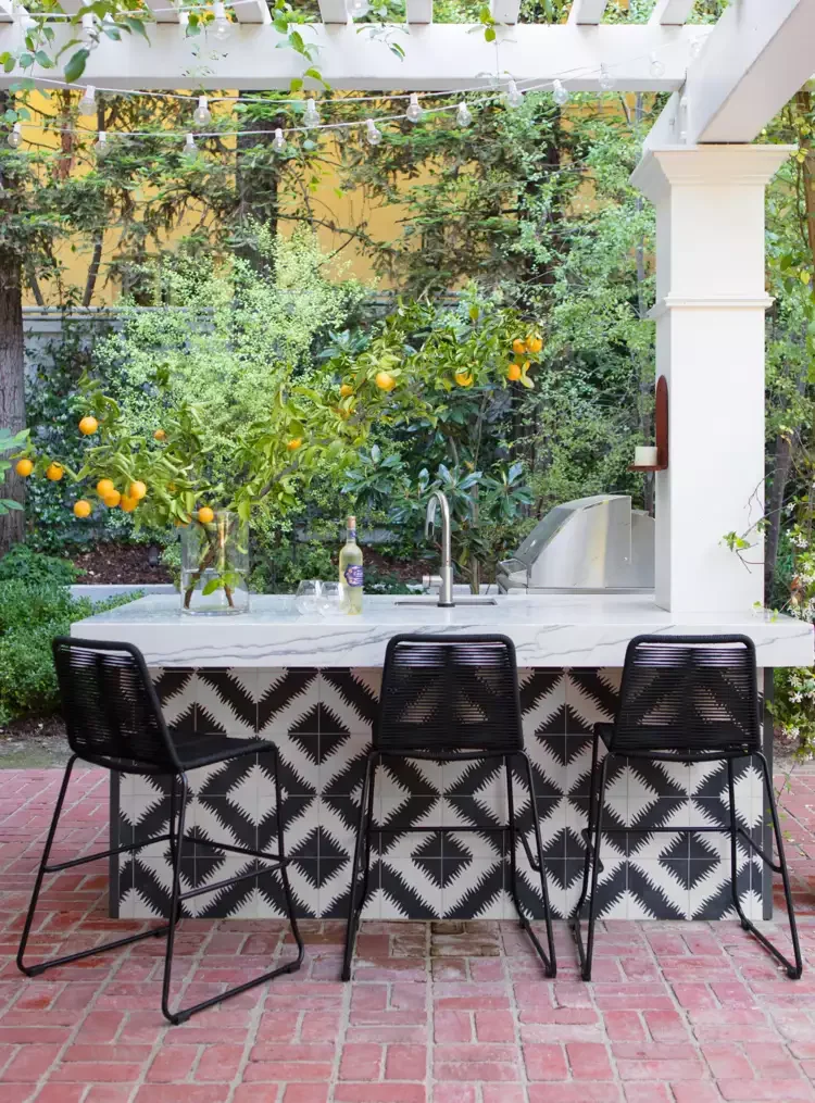 27 Creative Small Outdoor Kitchen Ideas That Transform Your Space 5 Outdoor Kitchen With a Graphic Punch