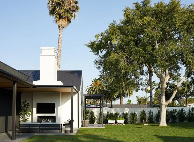 22 Brilliant Outdoor TV Ideas That Transform Your Backyard Into an Entertainment Paradise 16 Outdoor TV Under Patio Roof