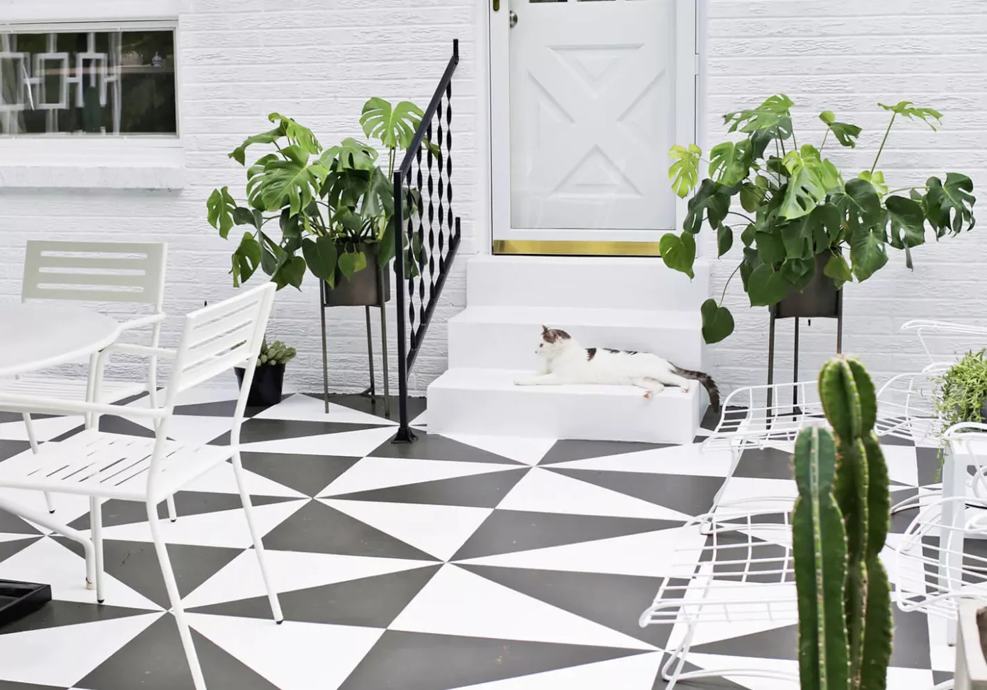 40 Budget-Friendly DIY Backyard Projects to Create Your Dream Outdoor Space Paint Bland Patio Tiles for an Easy Upgrade