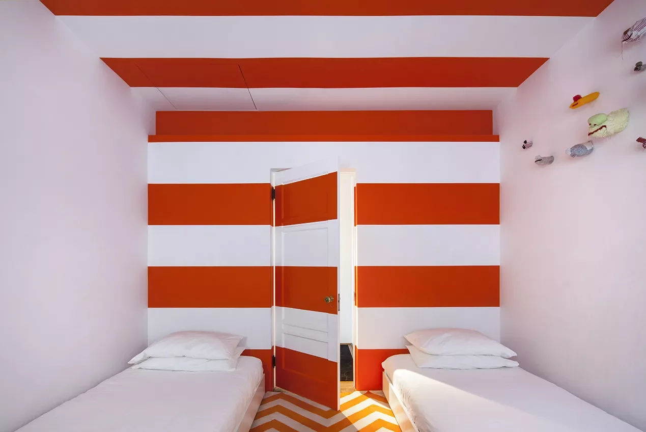 22 Smart Ways to Fit Two Beds in Your Small Bedroom 15 Paint Horizontal Stripes