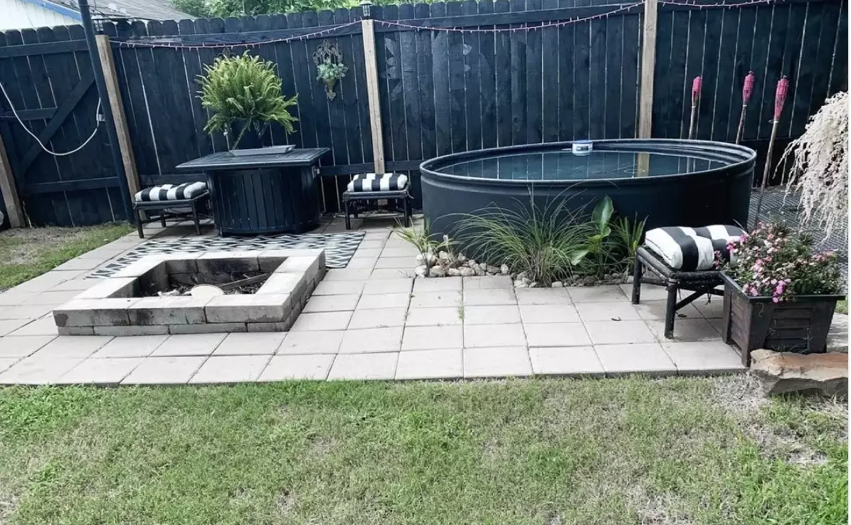 33 Creative Stock Tank Pool Ideas to Transform Your Backyard 8 Paint It Black