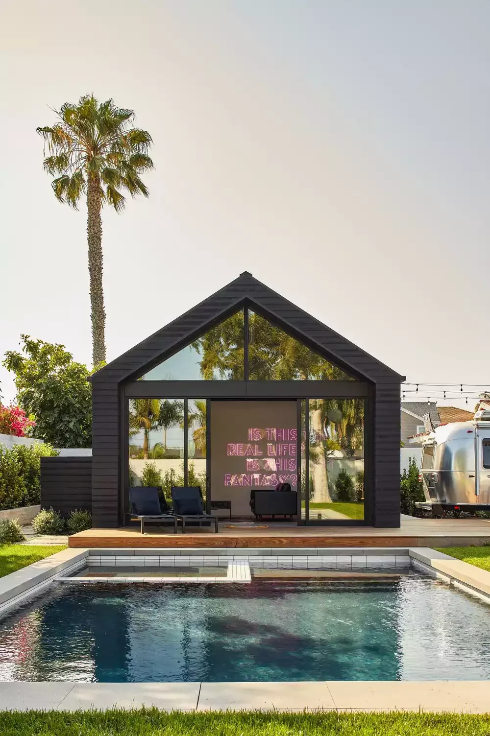 38 Stunning Pool House Ideas to Create Your Dream Backyard Retreat 1 Paint It Black