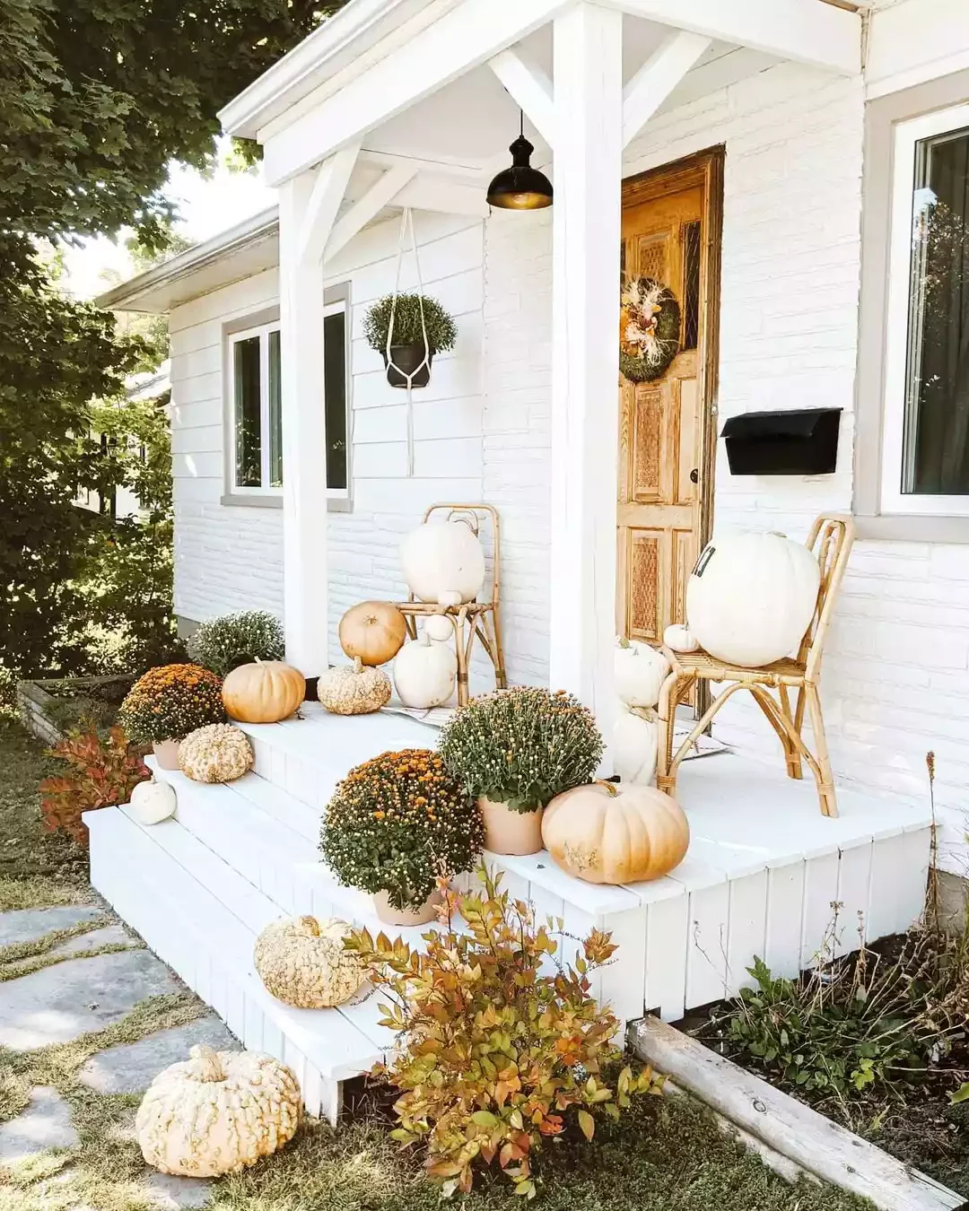 38 Charming Farmhouse Porch Ideas That Create the Perfect Welcome 4 Paint It White