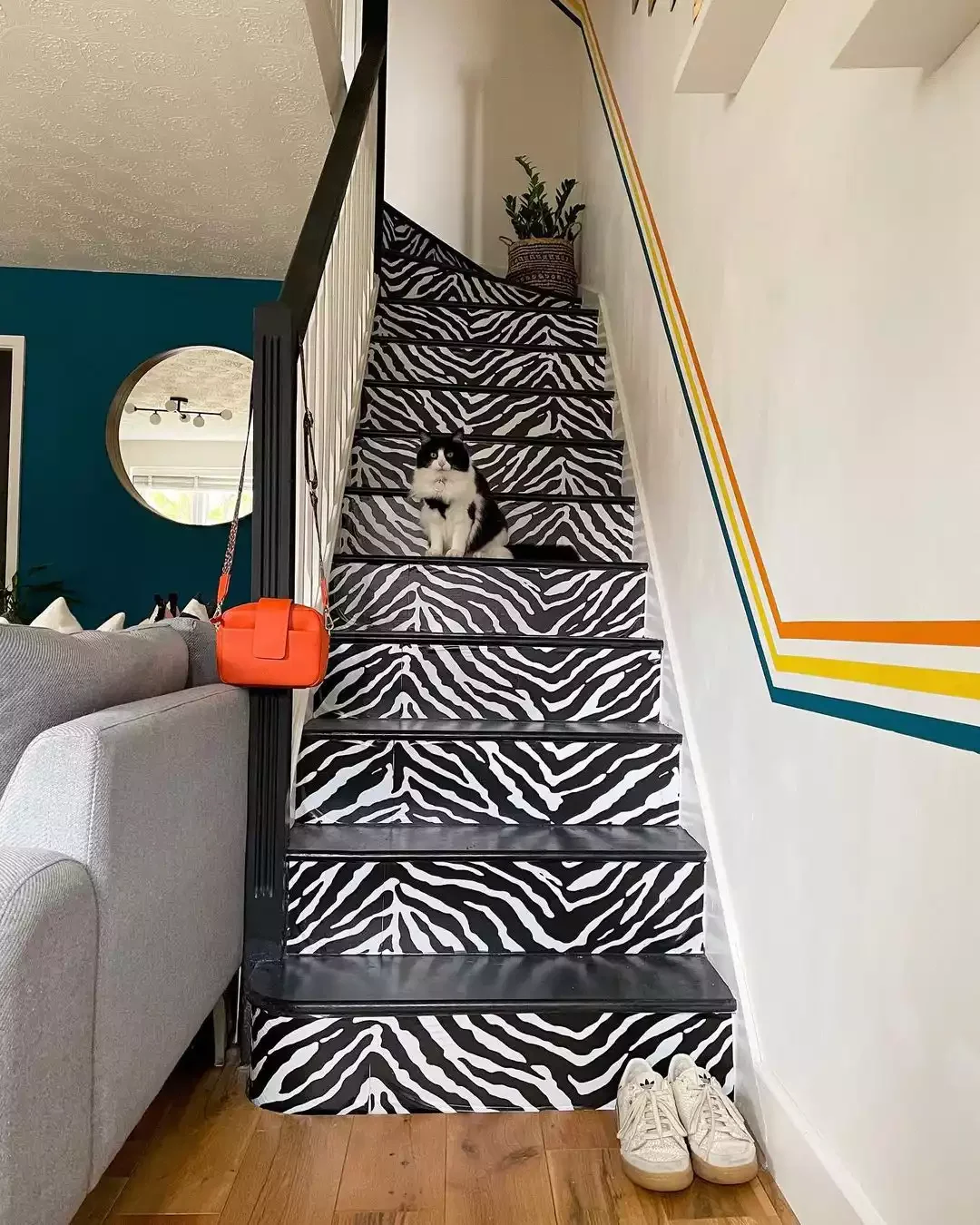 30 Creative Staircase Wall Decorating Ideas That Will Transform Your Space 29 Paint Some Stripes
