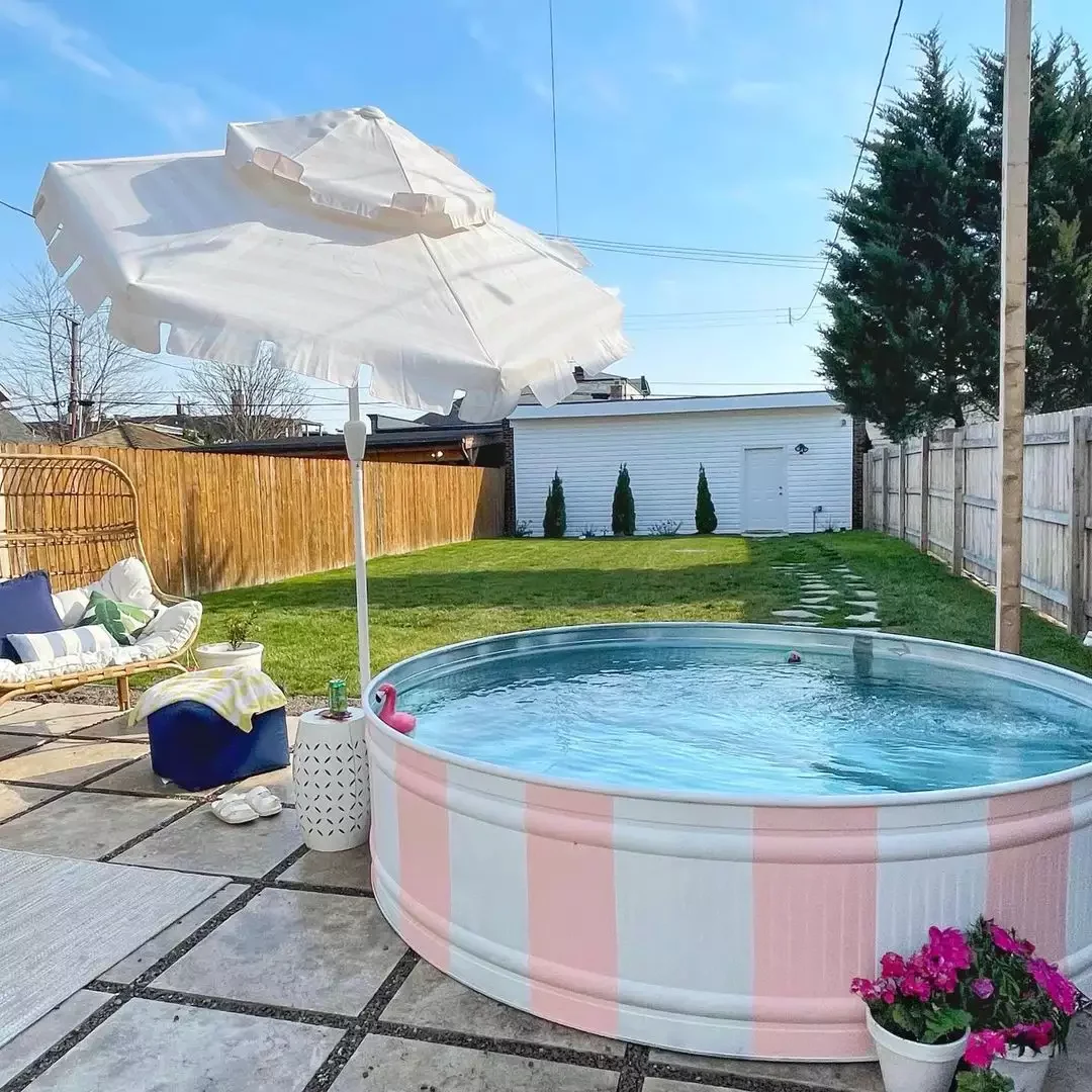 37 Budget Backyard Ideas That Create a Stunning Retreat Paint Your Stock Tank Pool