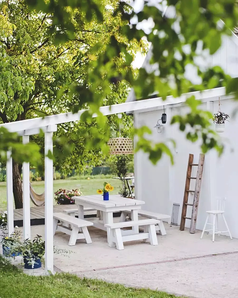 37 Budget Backyard Ideas That Create a Stunning Retreat Paint a Picnic Bench