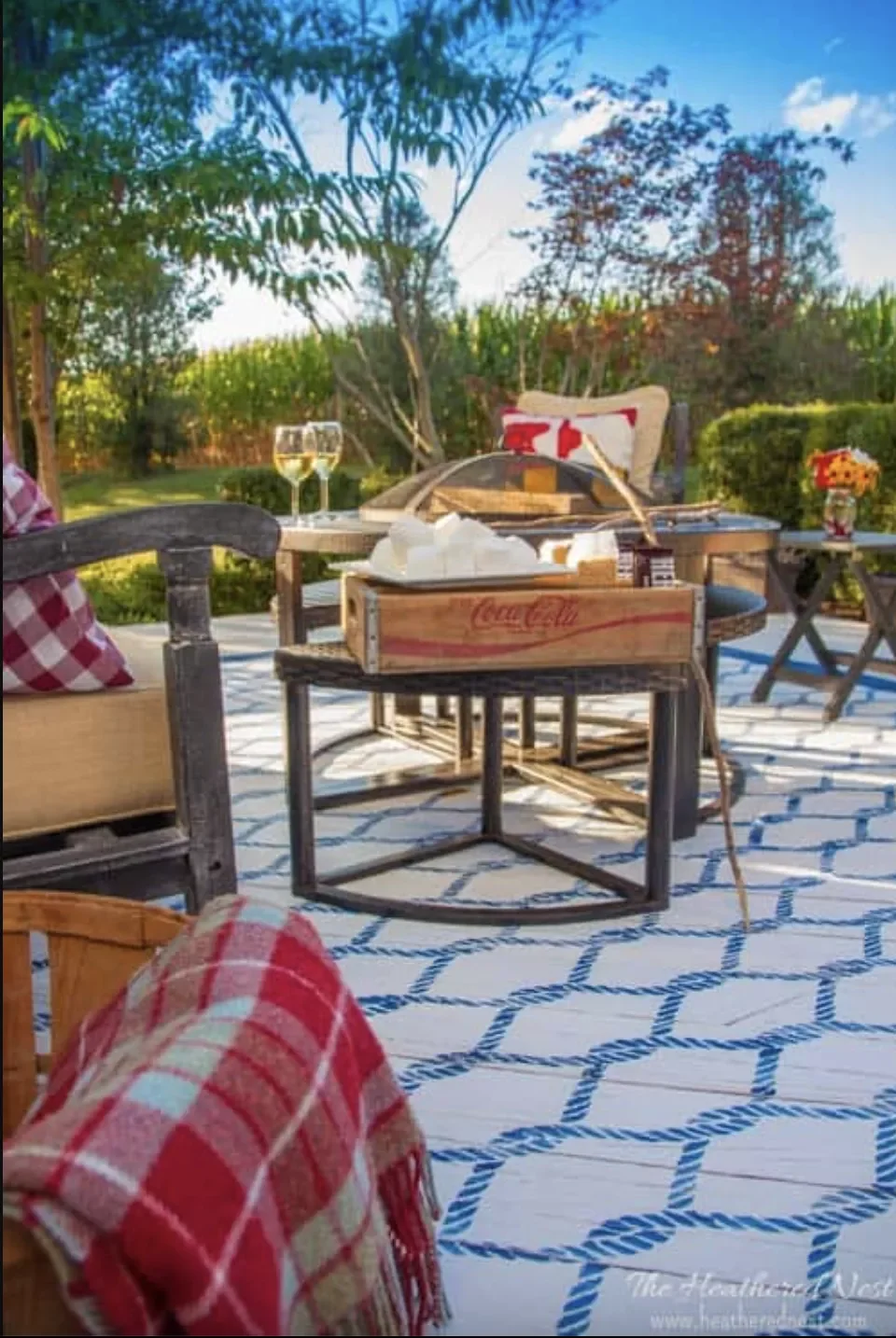 40 Budget-Friendly DIY Backyard Projects to Create Your Dream Outdoor Space Paint a Rug for the Yard