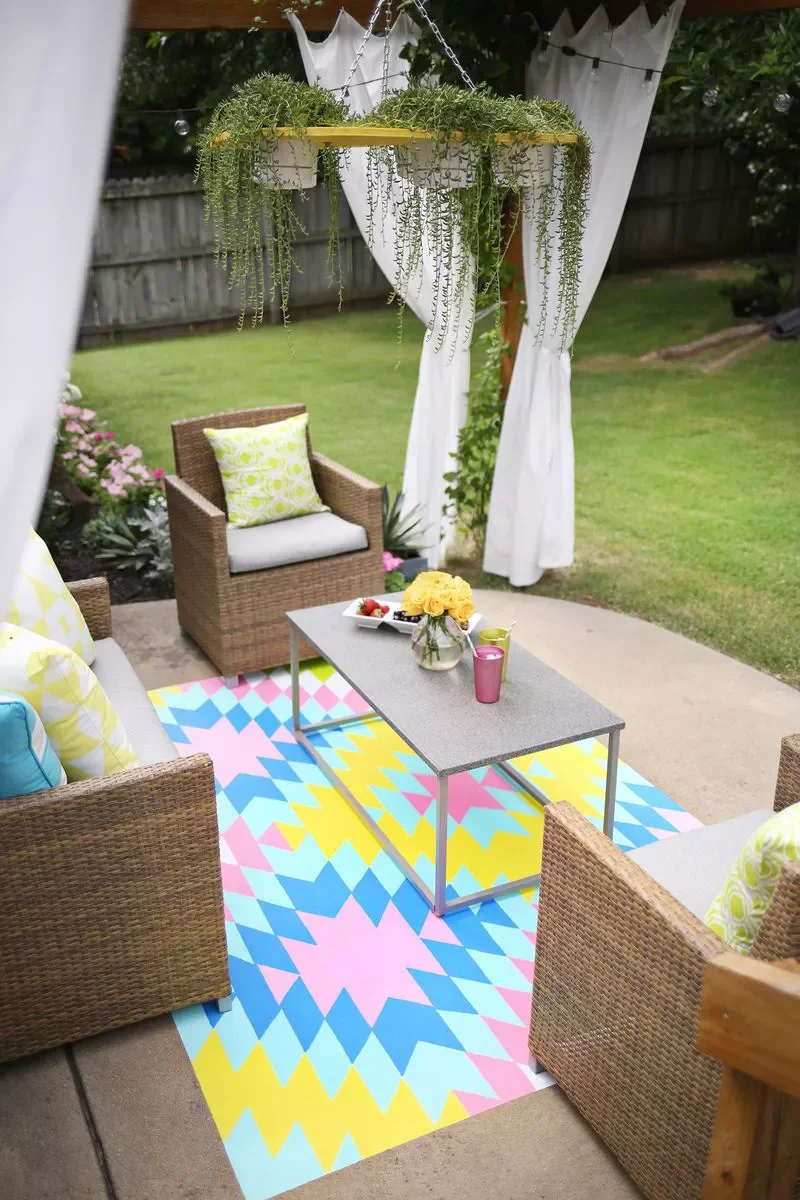 54 Small Patio Ideas That Will Transform Your Outdoor Space Paint a Rug