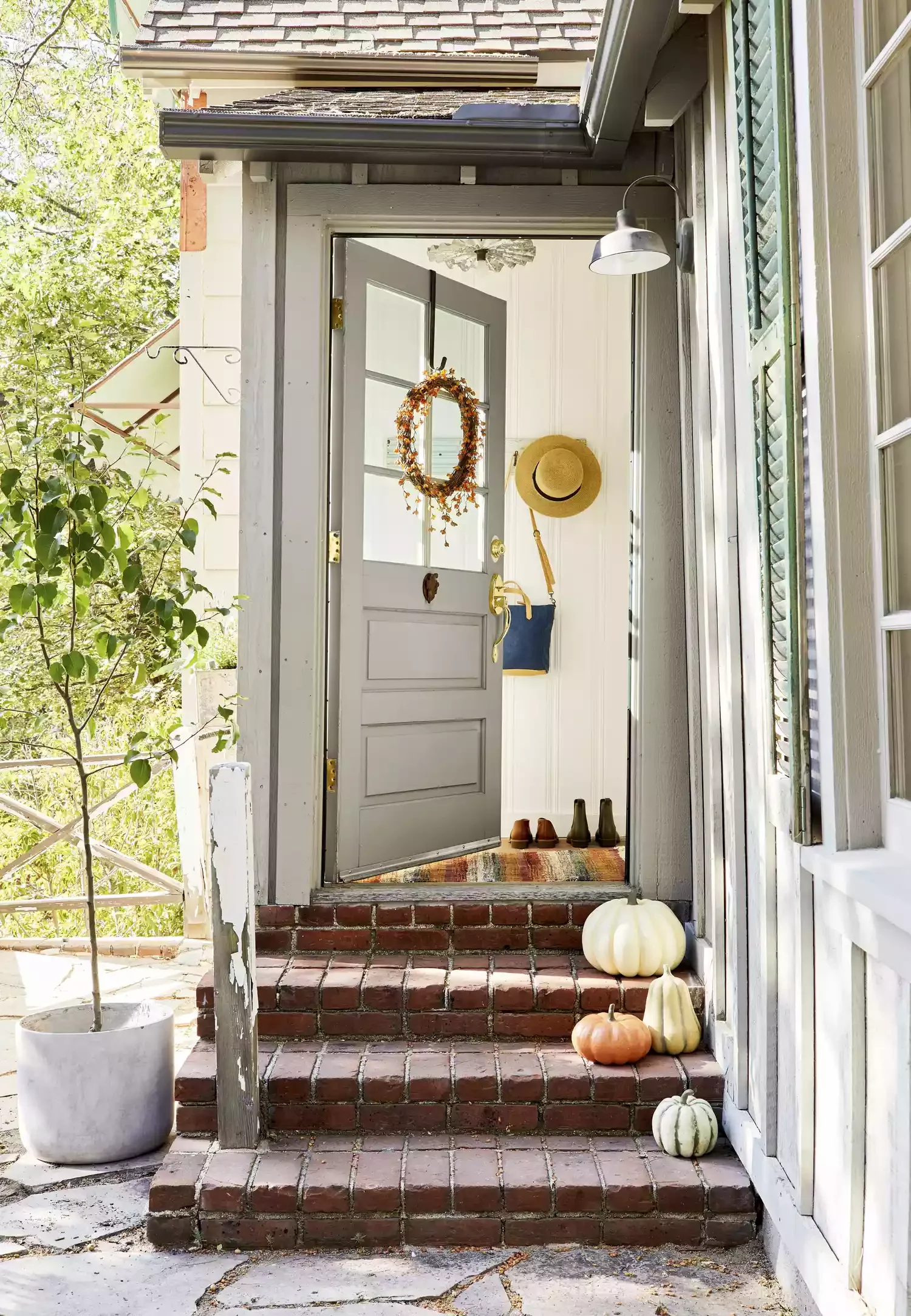 38 Charming Farmhouse Porch Ideas That Create the Perfect Welcome 14 Paint the Front Door