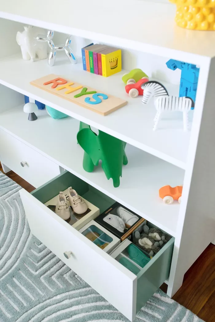 27 Beautiful Sage Green Nursery Ideas to Create Your Baby's Peaceful Haven 20 Paint the Inside Drawers