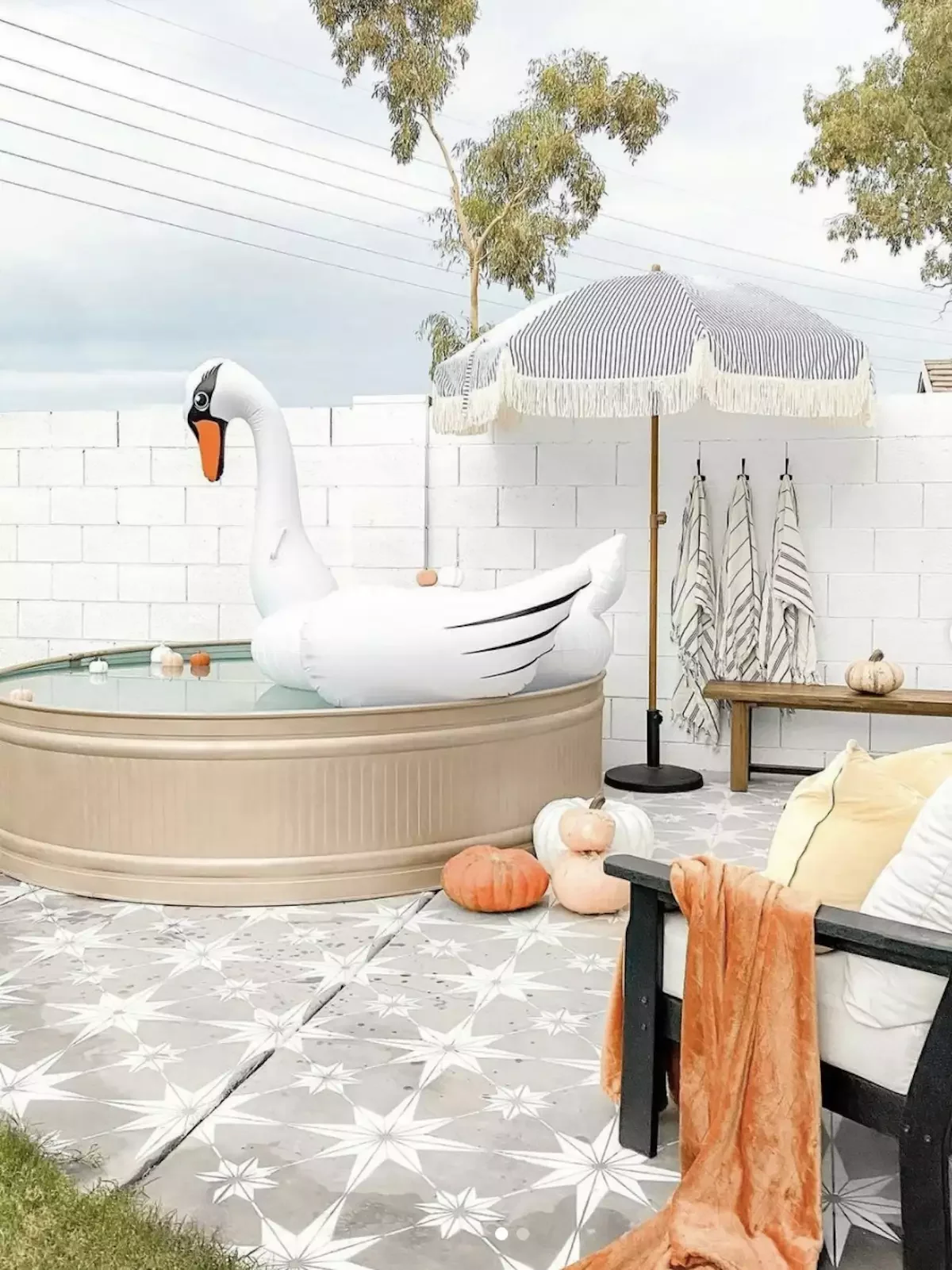 33 Creative Stock Tank Pool Ideas to Transform Your Backyard 1 Paint the Stock Tank