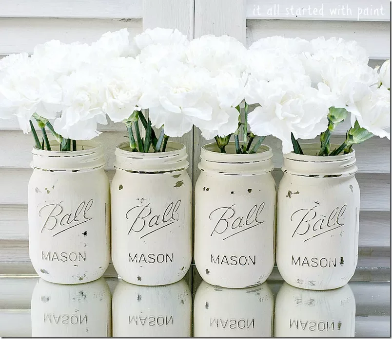 52 Gorgeous Spring Table Centerpiece Ideas to Transform Your Dining Space 43 Painted Mason Jars