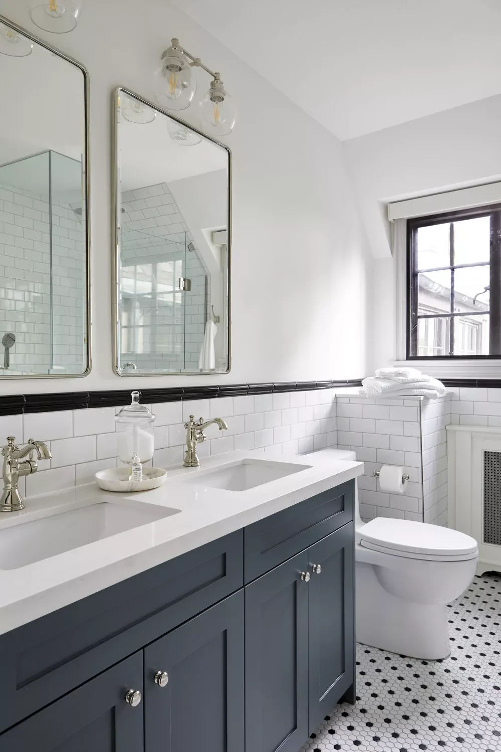 18 Navy Blue Bathroom Design Ideas That Will Transform Your Space 9 Painted Navy Blue Cabinets or Vanity