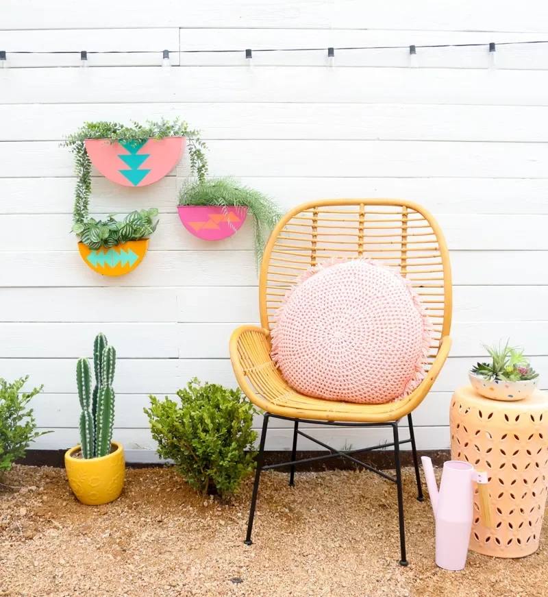 16 Creative Patio Wall Ideas That Will Transform Your Outdoor Living Space 9 Painted Planters