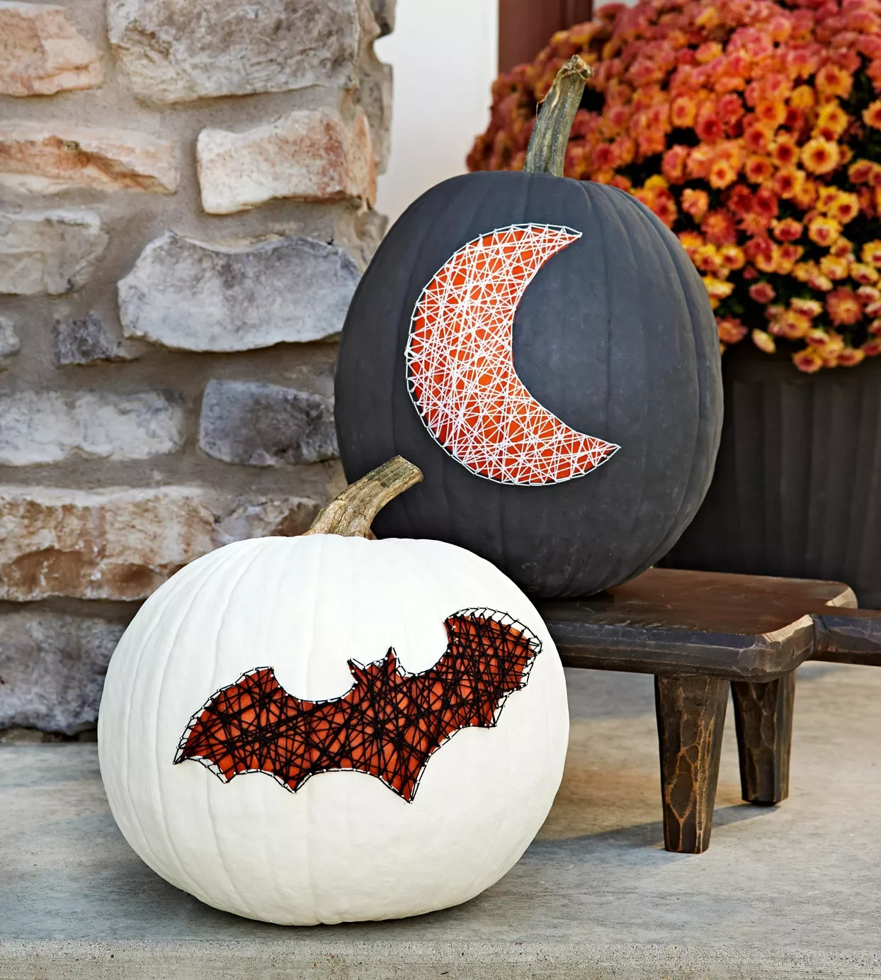 80 Quick Halloween Crafts You Can Complete in One Day 44 Painted Pumpkins with Webbed Shapes