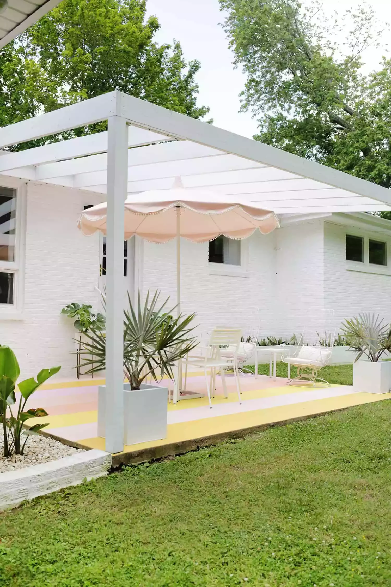36 Stunning Concrete Patio Designs That Will Transform Your Outdoor Space 14 Painted Stripe Concrete Patio