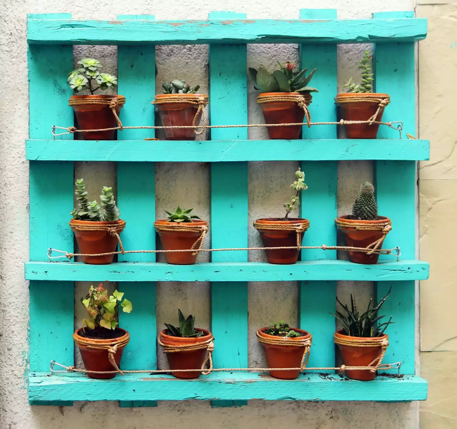 15 Creative Ways to Transform Wooden Pallets Into Stunning Garden Decor 5 Painted Vertical Garden
