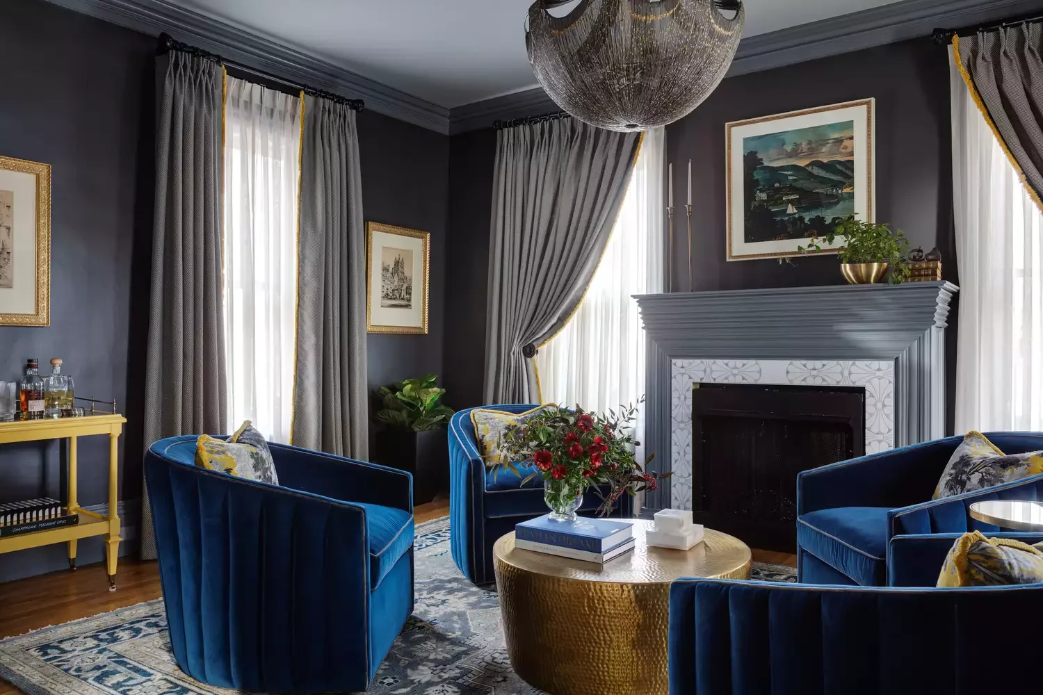 30 Dark and Dramatic Living Rooms That Will Transform Your Space Pair Blue and Gold
