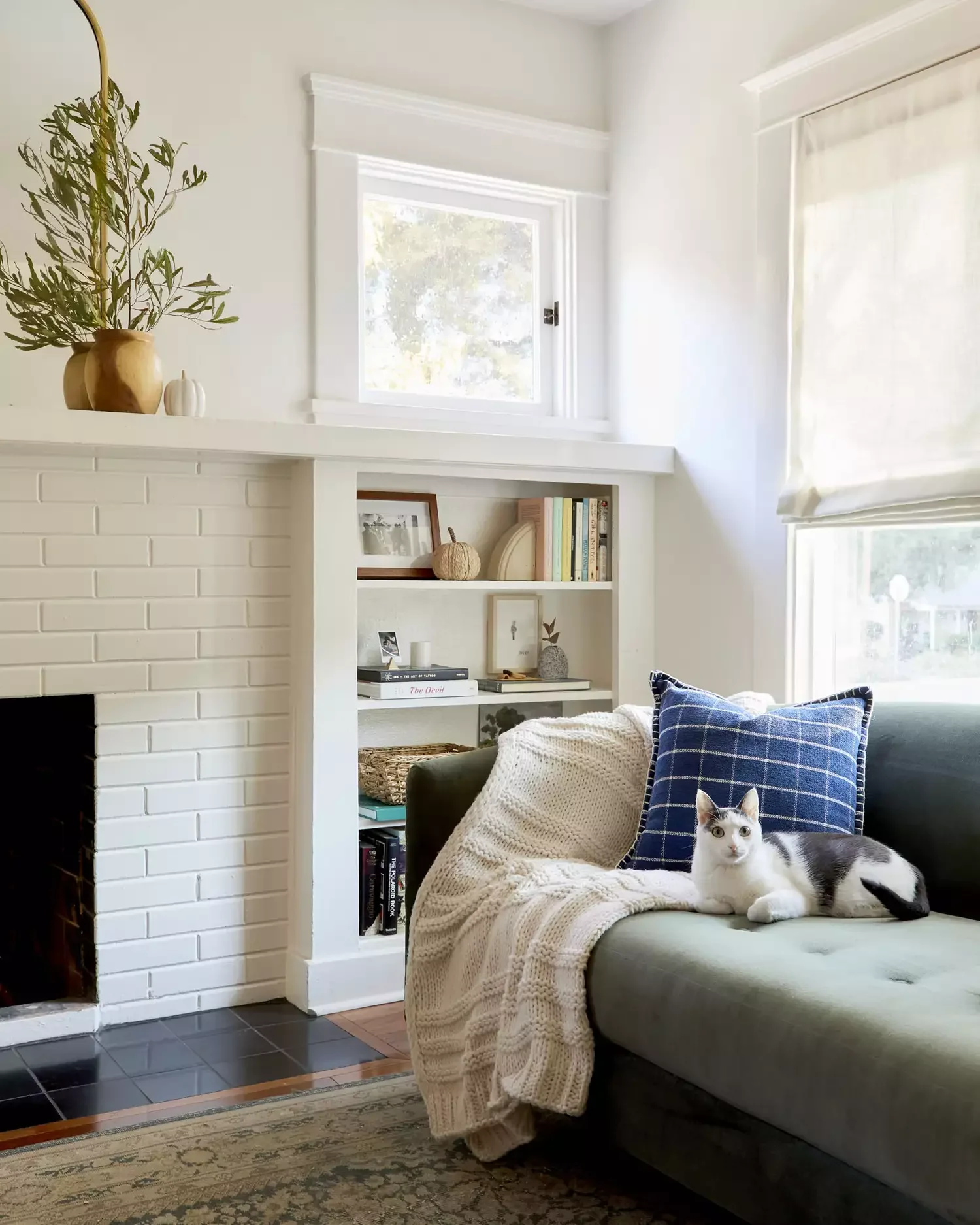 30 Enchanting Halloween Fireplace Mantel Ideas to Transform Your Space 19 Pair Brass Finishes With Pumpkins