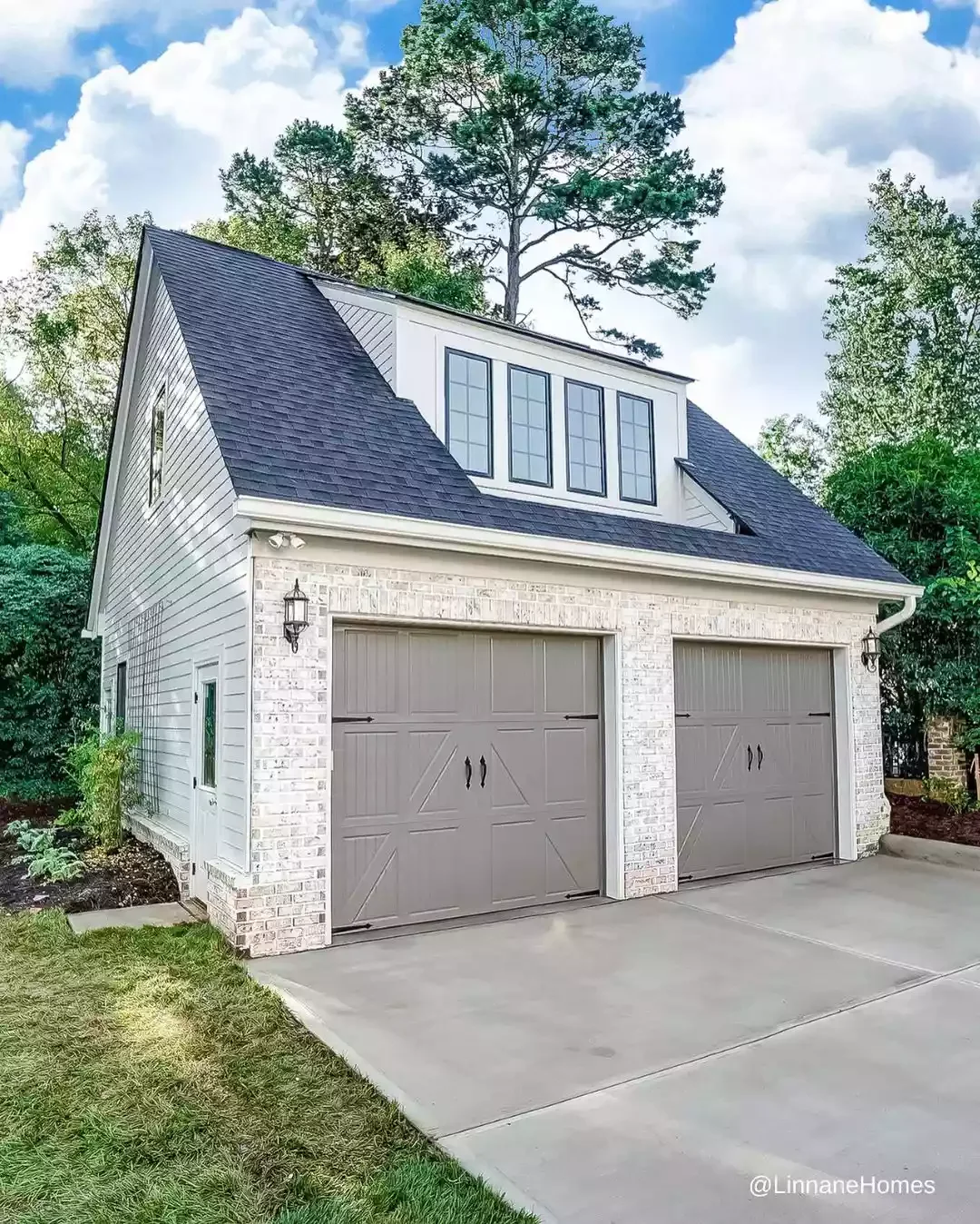 23 Stunning Detached Garage Ideas That Will Transform Your Home's Curb Appeal Pair Brick and Vinyl