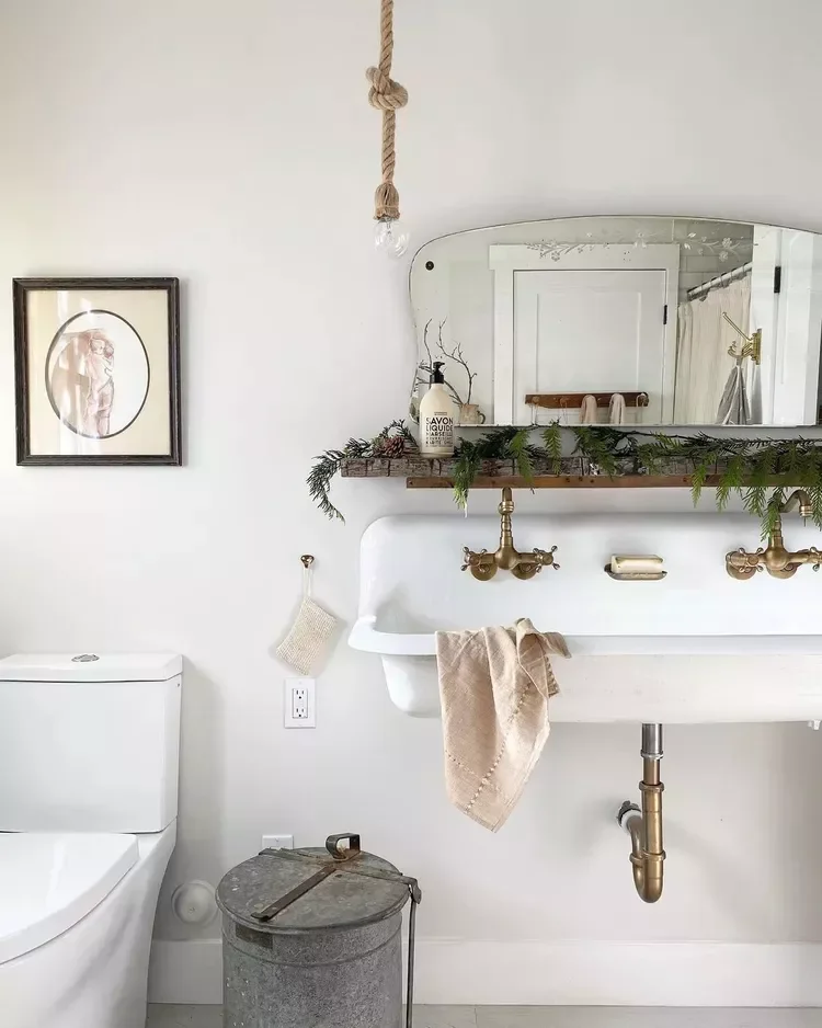 32 Christmas Bathroom Ideas That Create a Holiday Wonderland Pair Greens and Pinecones