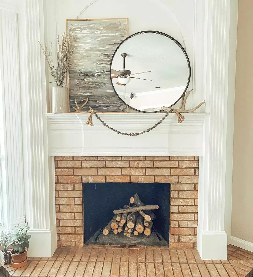 51 Creative Fireplace Mantel Decorating Ideas That Will Transform Your Living Space 7 Pair Mirrors and Artwork