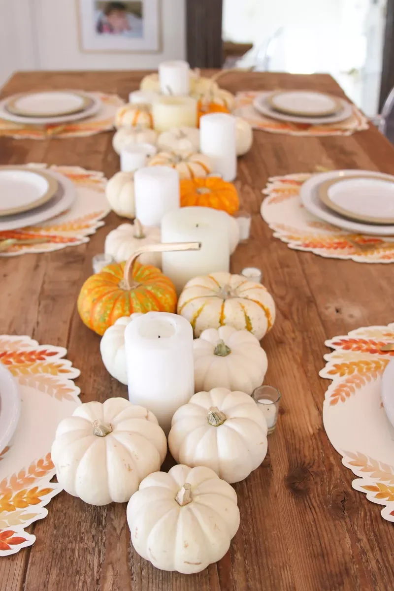 78 Beautiful Fall Table Decorating Ideas to Transform Your Seasonal Celebrations 1 Pair Pumpkins and Candles