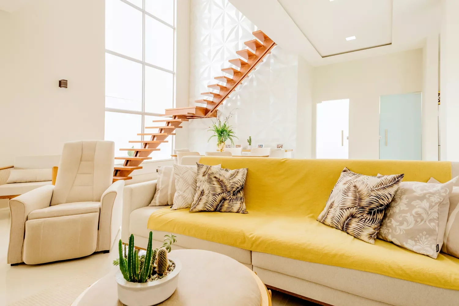 20 Stunning Yellow Living Room Ideas That Will Transform Your Space 19 Pair White and Yellow