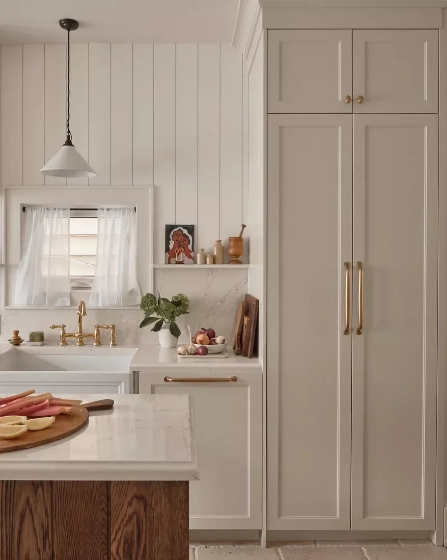 20 Gorgeous Cream Kitchen Cabinet Ideas to Transform Your Space 4 Pair With Gold Accents