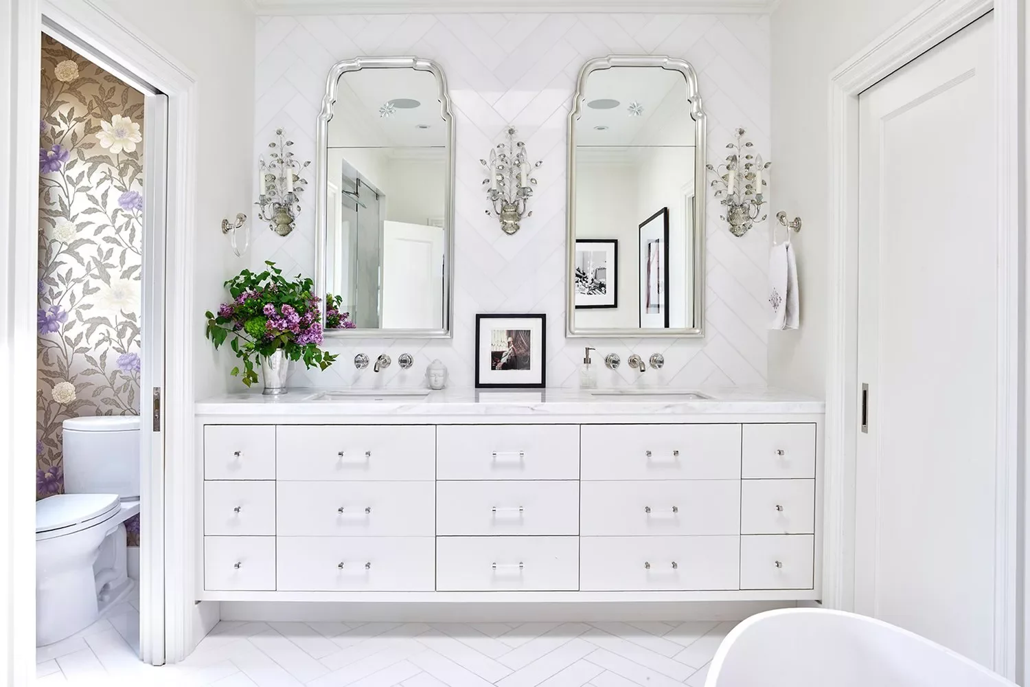 22 Simple White Bathroom Ideas That Make a Big Impact Pair With Silver Accents