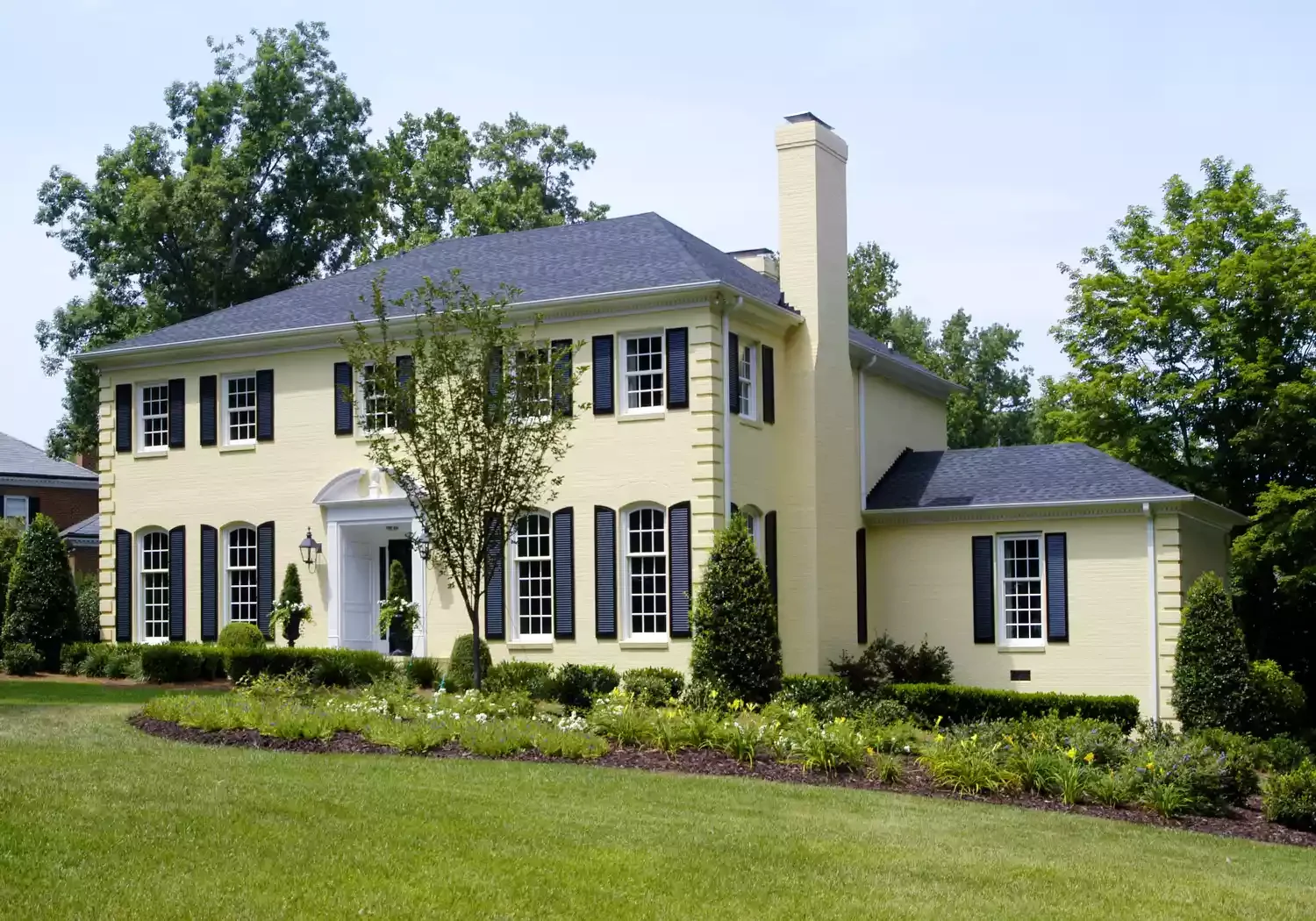 21 Bold Brick Paint Colors That Will Transform Your Home's Exterior 4 Pale Yellow