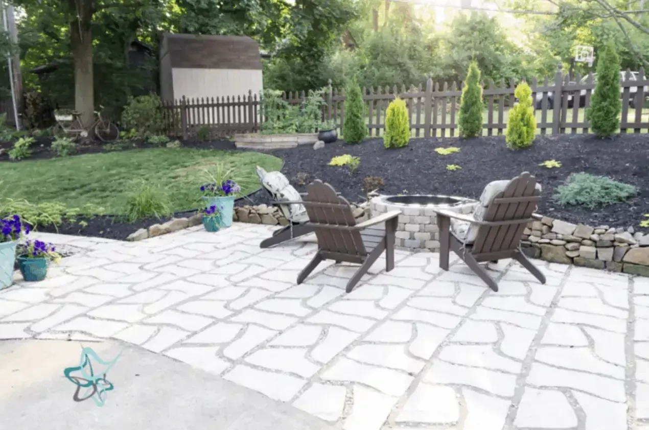 16 Creative Patio Extension Ideas to Maximize Your Outdoor Living Space 12 Patio Extension With Wavy Pavers and Gravel