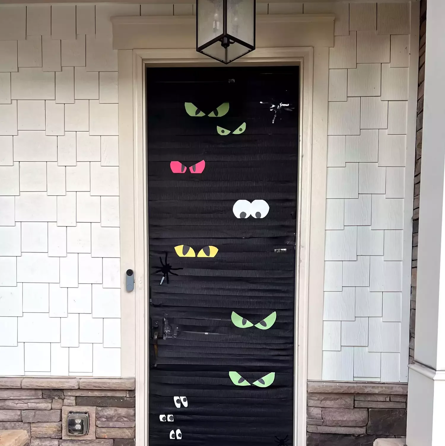 42 Quick Halloween Door Decorations You Can Create in Under an Hour 22 Peeping Eyes Door