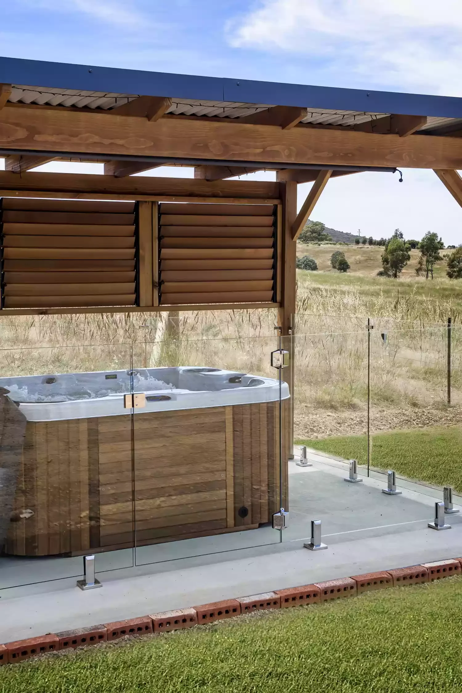 18 Creative Ways to Add Privacy to Your Backyard Hot Tub Retreat 10 Pergola With Wood Blinds
