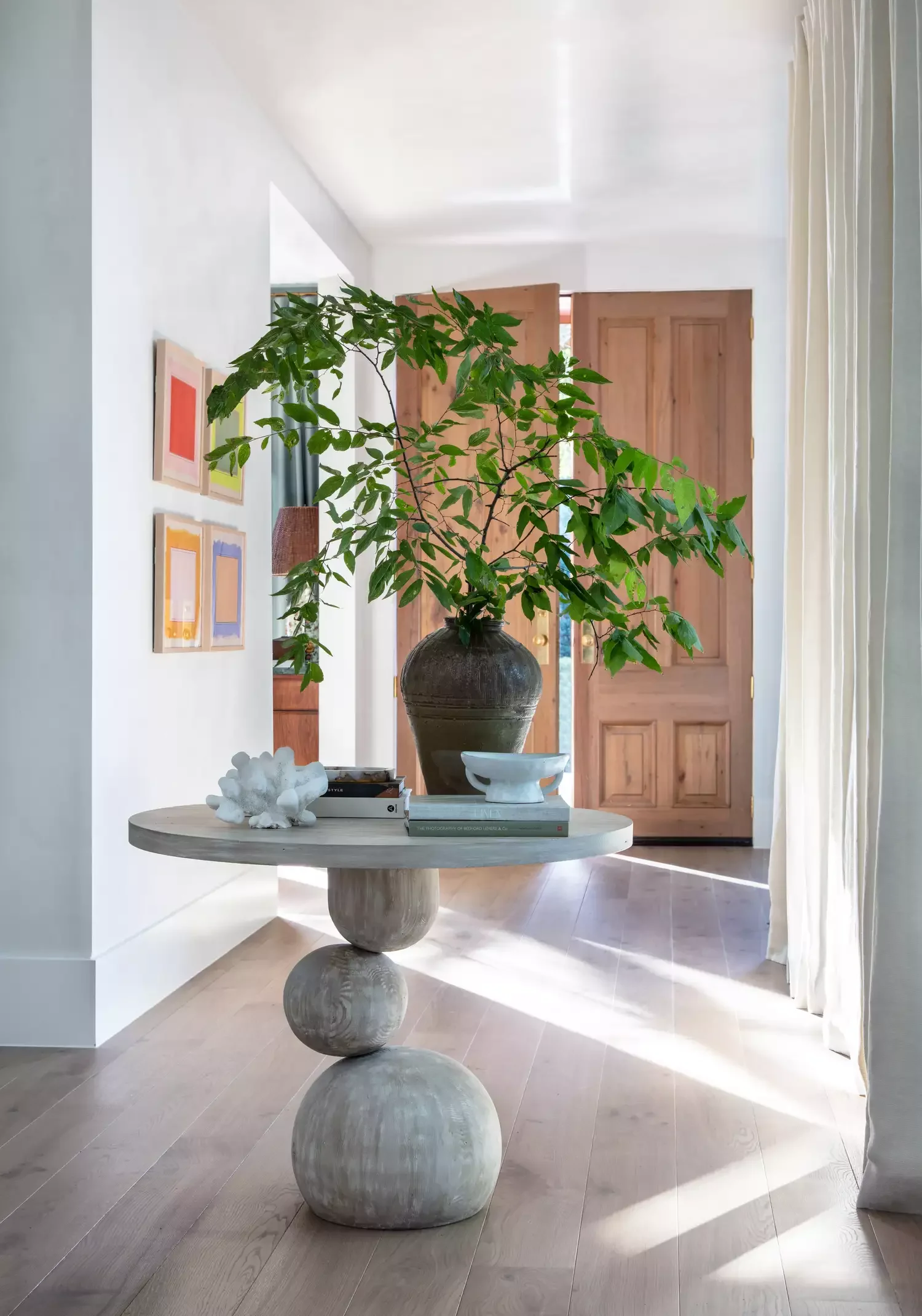 22 Stunning Entryway Wall Ideas That Create an Amazing First Impression 23 Picture Some Colorful Art