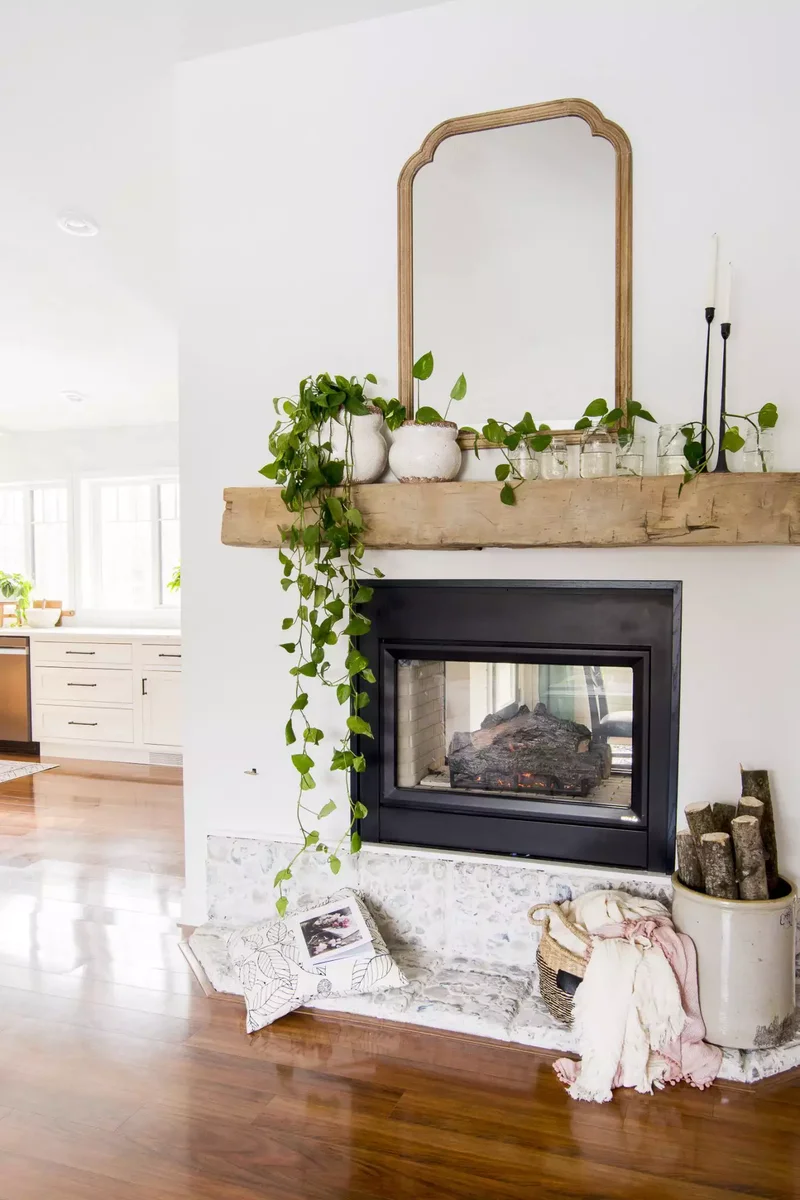 44 Beautiful Fireplace Mantel Styling Ideas 29 Pile On the Plants