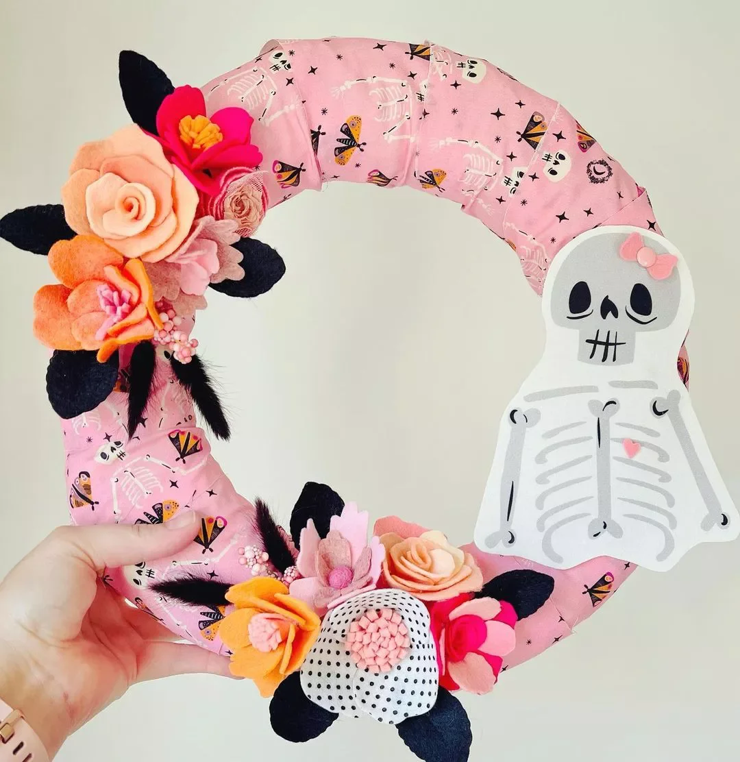 45 Spooktacular Halloween Wreath Ideas That Will Make Your Front Door the Neighborhood's Favorite Stop 14 Pink Halloween Wreath