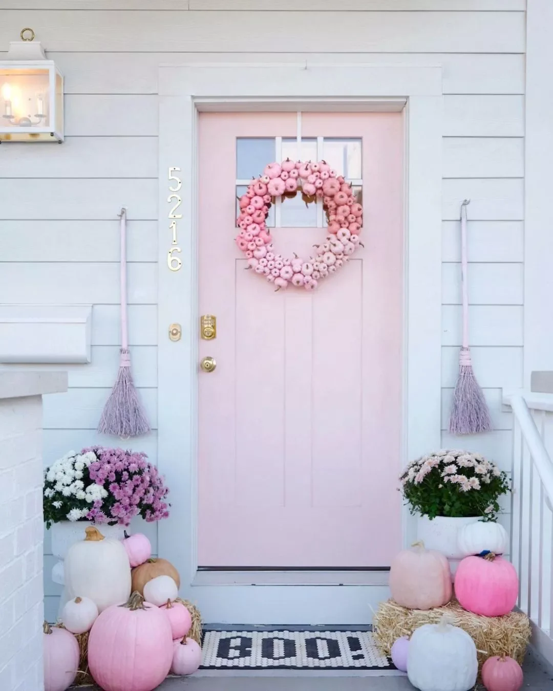 42 Quick Halloween Door Decorations You Can Create in Under an Hour 12 Pink Pumpkin Door Decor