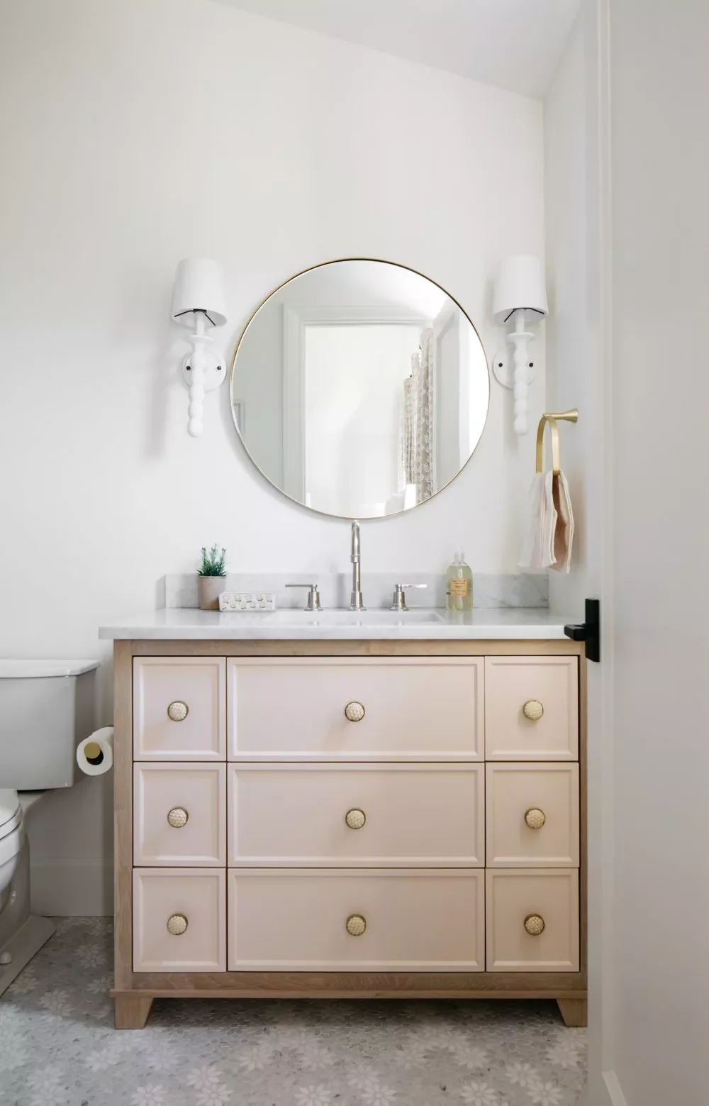 25 Compact Bathroom Vanity Ideas That Maximize Style and Storage 19 Pink Vanity With Marble Top
