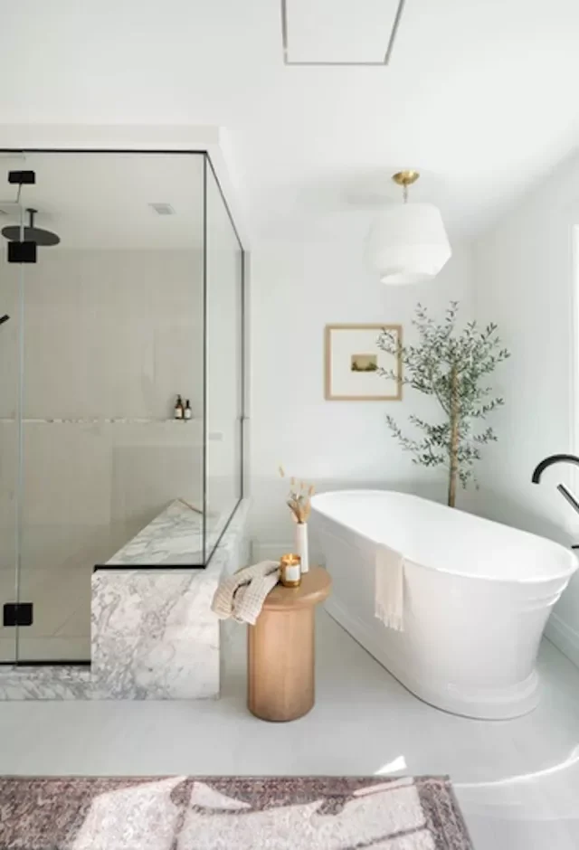 32 Clever and Stylish Ways to Store Your Towels Place Towels on a Decorative Stool